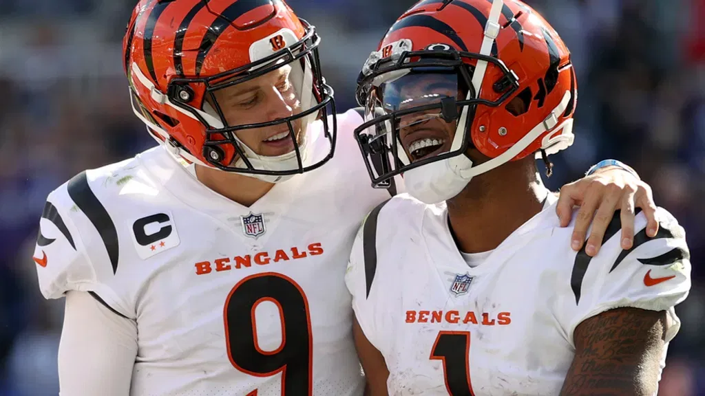 Joe Burrow #9 of the Cincinnati Bengals and Ja'Marr Chase #1 celebrate a touchdown during the second half in the game against the Baltimore Ravens at M&T Bank Stadium on October 24, 2021 in Baltimore, Maryland. (Photo by Rob Carr/Getty Images)